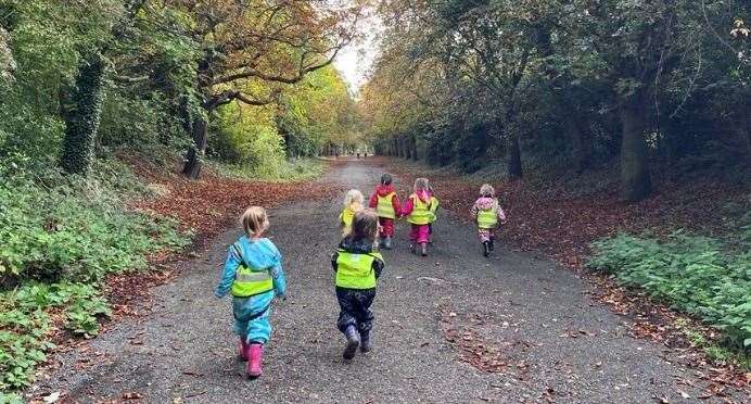 Dimples children on a woodland walk