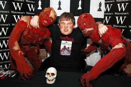 Darren Shan gets to grips with fans at one of his previous Bluewater signings