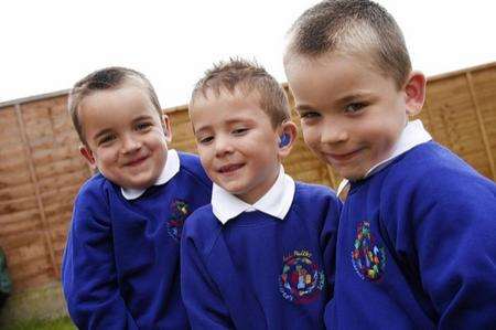 Twins Matthew and Reece Shadick with Callan Durkin, centre, who were all cared for at the Oliver Fisher special care unit