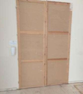 The door to the dining room was boarded up. Photo: Debbie George