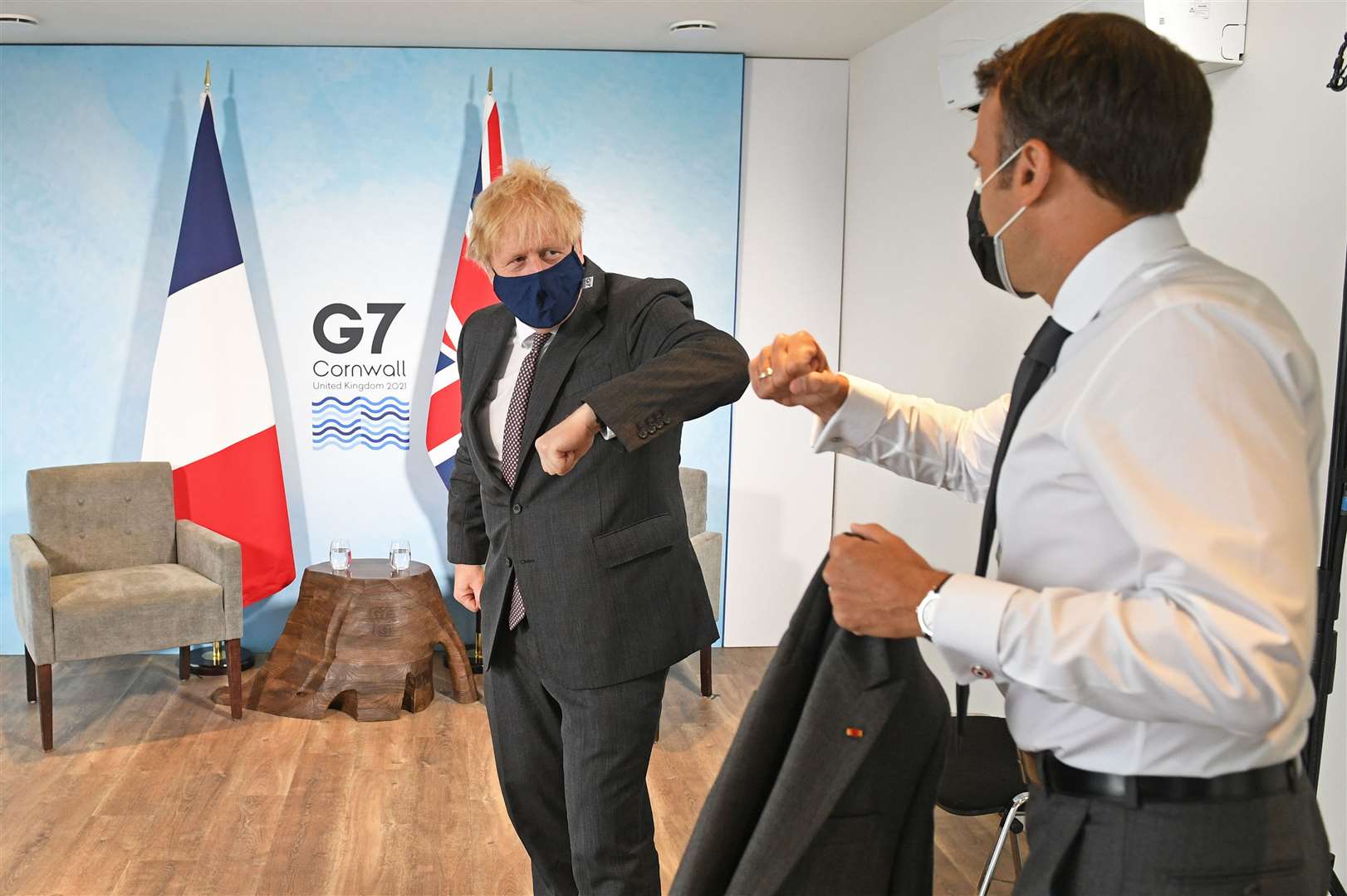 Prime Minister Boris Johnson greets French President Emmanuel Macron at the summit (Stefan Rousseau/PA)