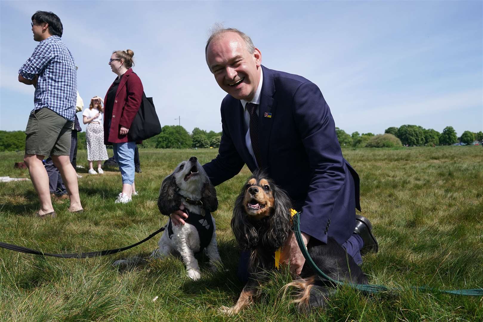 Liberal Democrat leader Ed Davey with Cora and Nelly as he visits Wimbledon Common to celebrate the party’s gains in the 2022 local elections (Aaron Chown/PA)