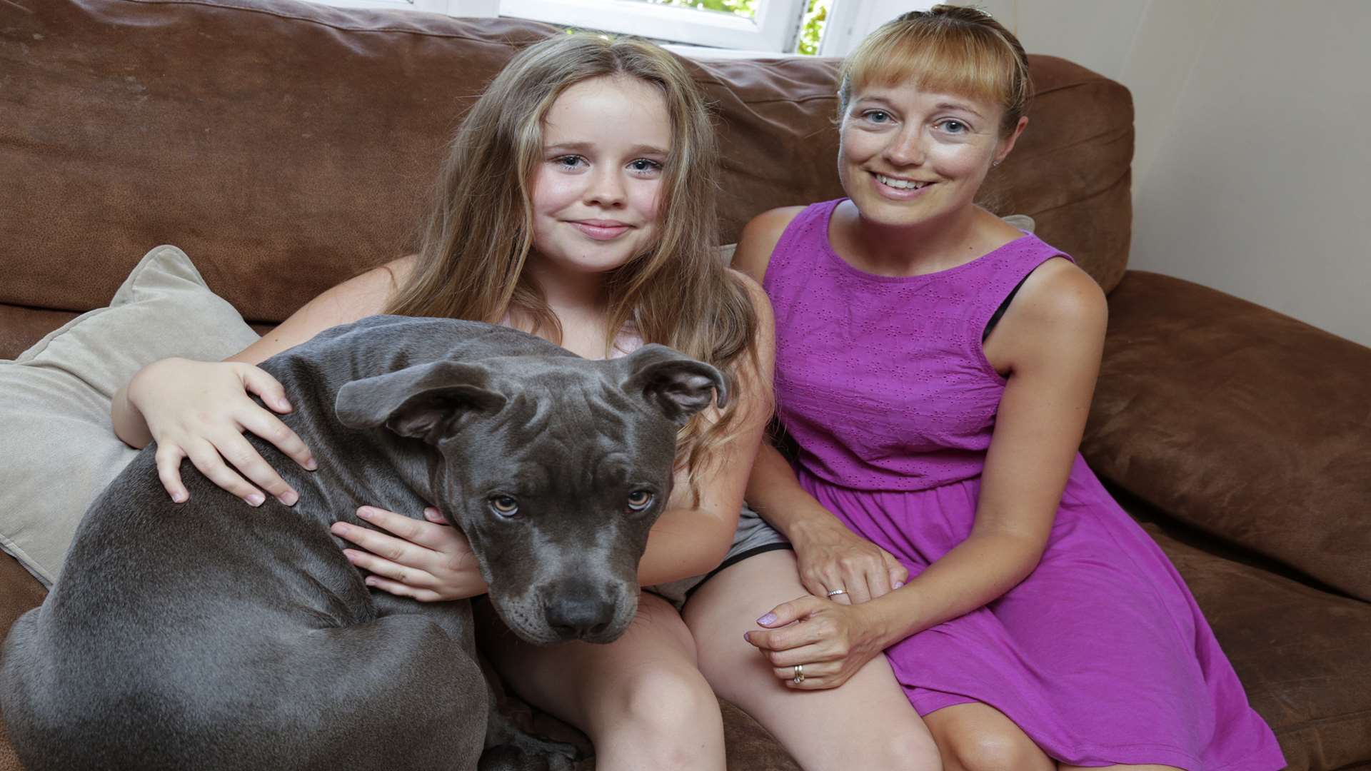 Susannah Adams with daughter Ellen and puppy, Alfie