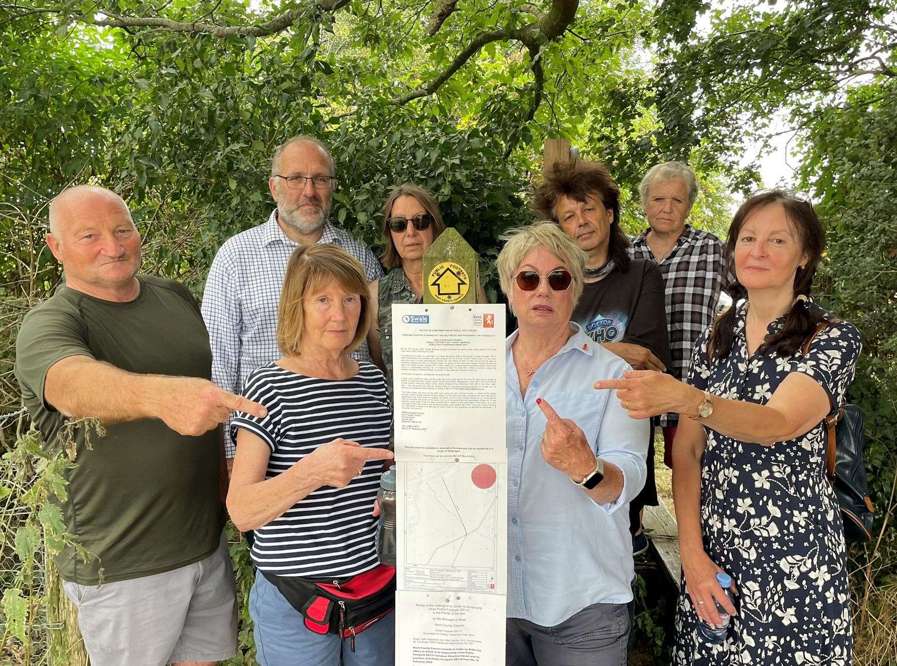 Borden and Grove Park residents from left John Sutton, Lee Small, Mary Christopher, Vivien Smith, Dale Sharman, Cllr Mike Baldock, Nicola Honey and Joelle Thorne. Picture: Joe Crossley