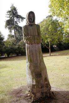 Monk carving on the Vines.