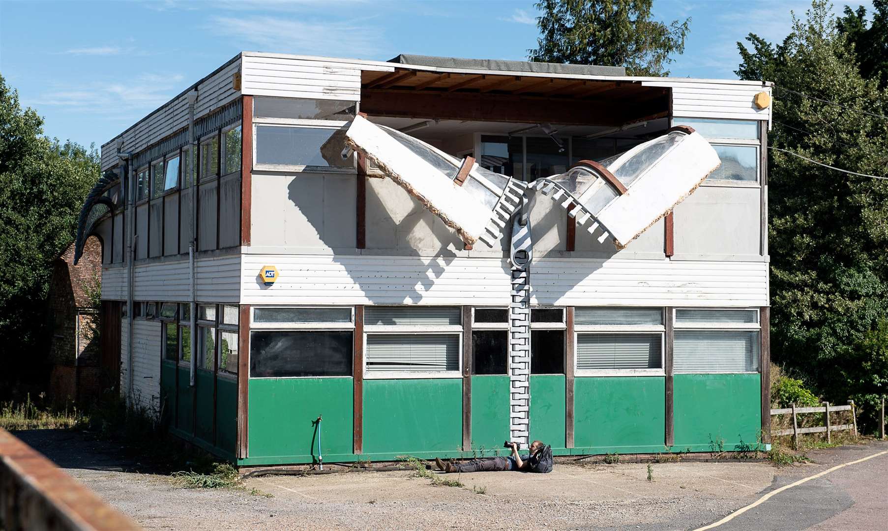 Sculptor Alex Chinneck turned the former office block into a zip. Picture: Alan Langley