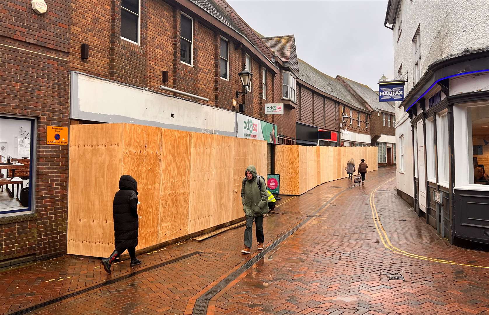 Hoardings now surround a number of units in New Rents. Picture: Steve Salter