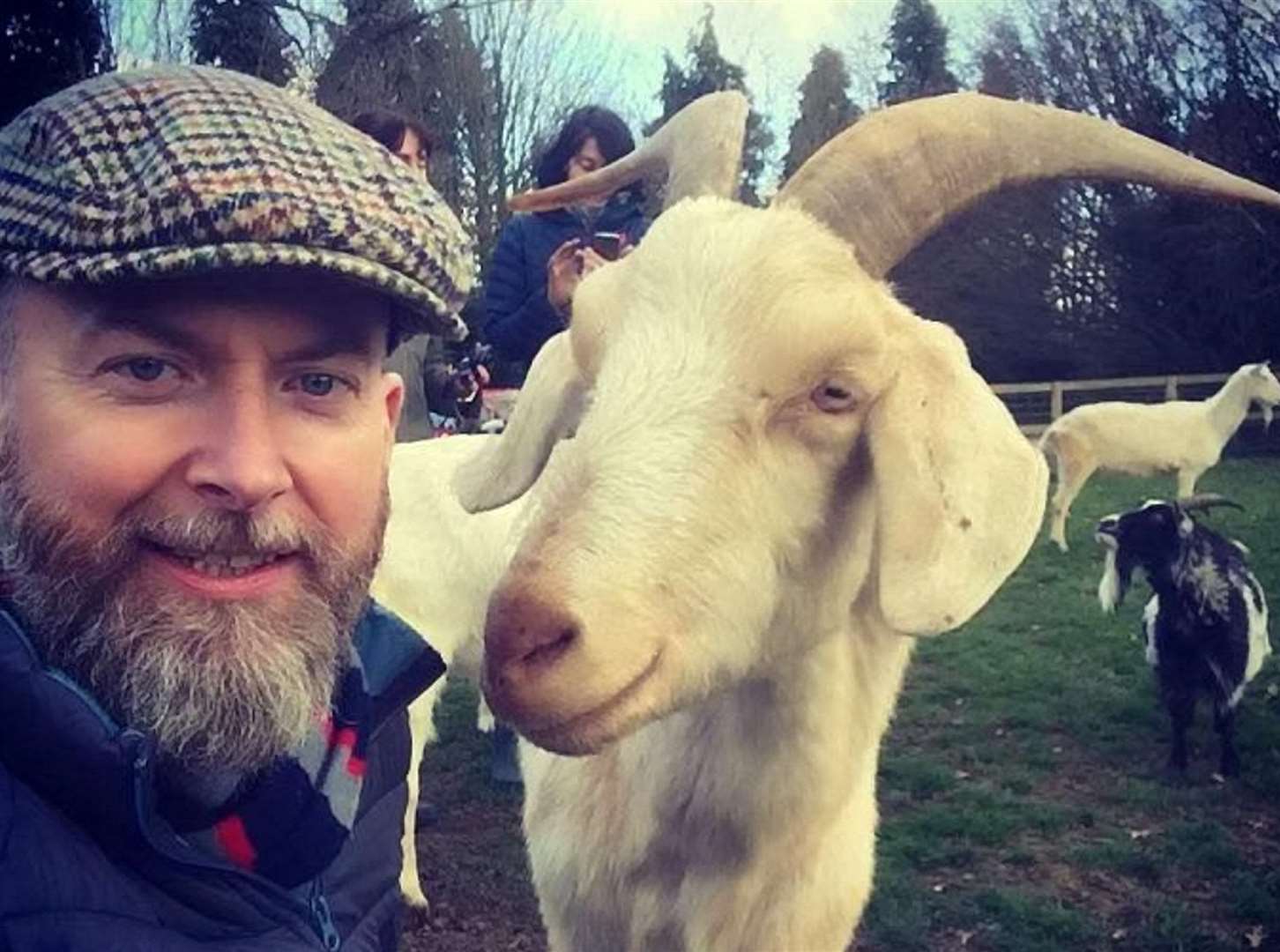 Dr Alan McElligott with one of the goats tested. Picture: SWNS