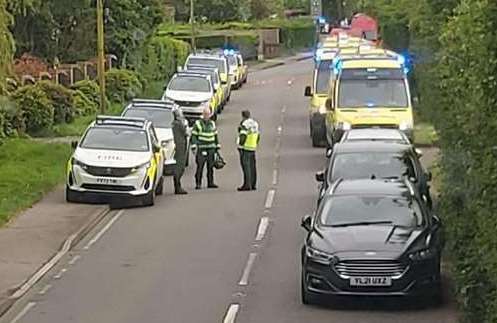 Several police cars and ambulances at the scene of the crash. Picture: John Dalton