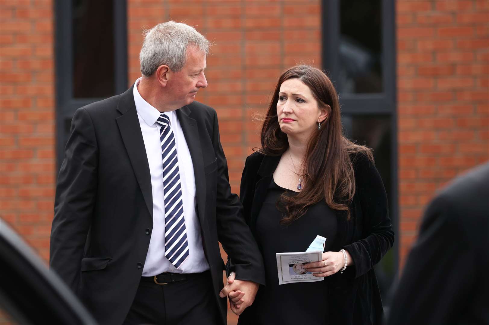 DUP MLA Emma Little-Pengelly and her husband Richard leave the Good Shepherd Church in Belfast (Liam McBurney/PA)