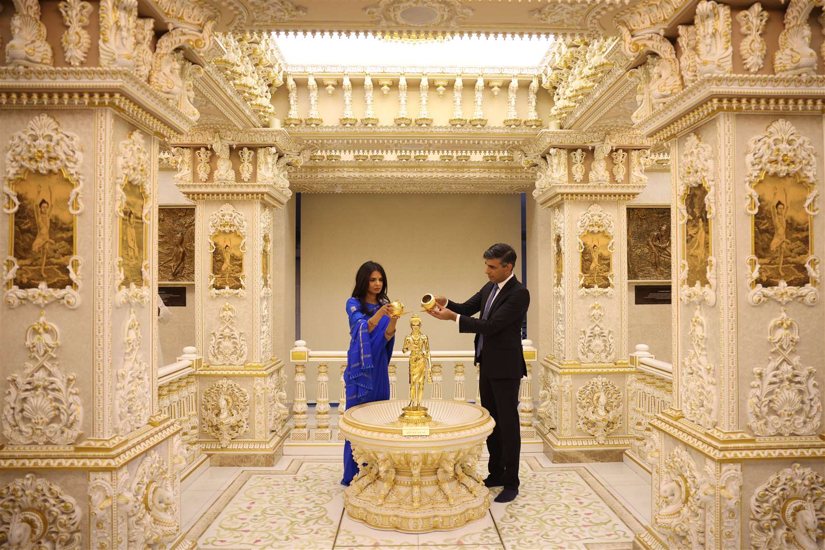 Mr Sunak and his wife performed rituals (Dan Kitwood/PA)