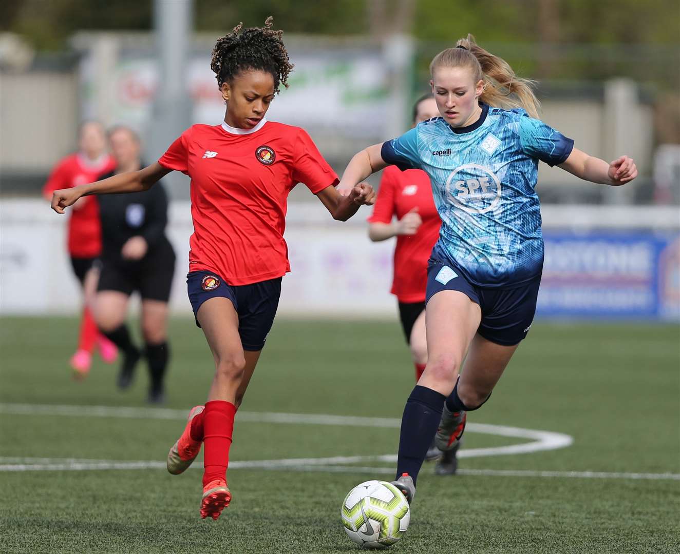 Action from the Kent Merit Under-16 Girls Cup Final as Ebbsfleet United (red) compete with London City Lionesses. Picture: PSP Images
