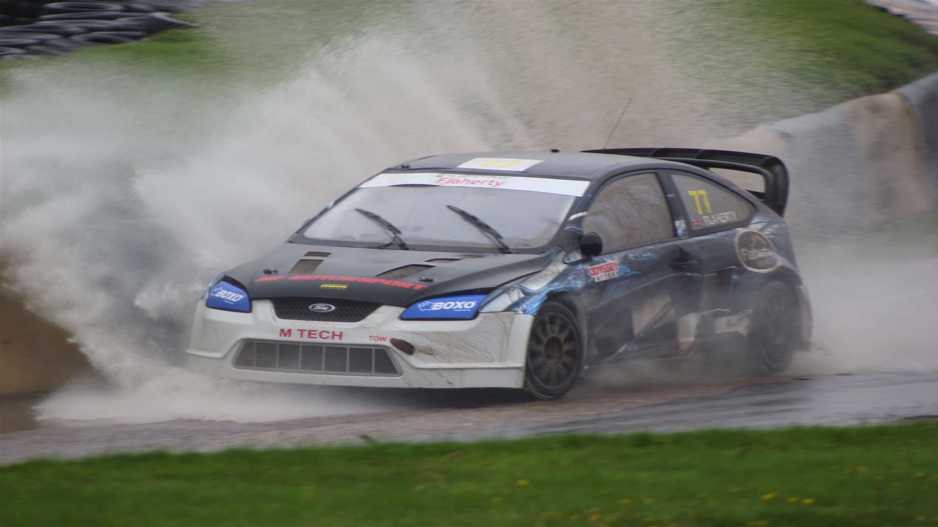 Mark Flaherty splashes through Paddock Bend. Picture: Joe Wright