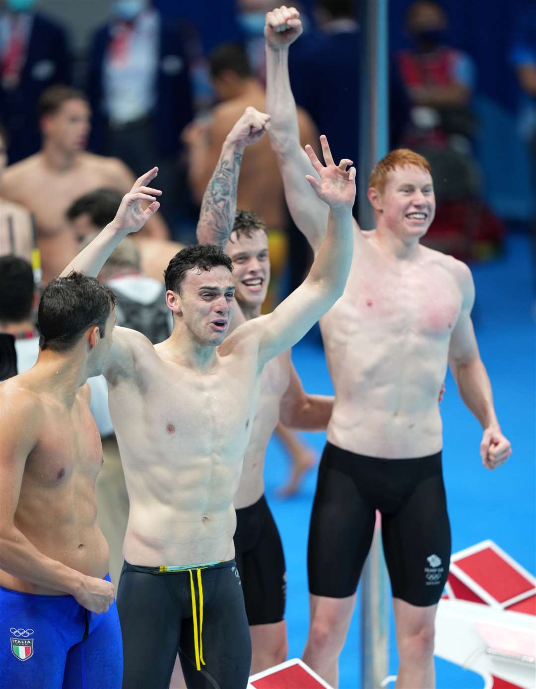 Great Britain’s James Guy, Matthew Richards and Tom Dean celebrate gold in the Men’s 4×200m freestyle relay at Tokyo Aquatics Centre (Joe Giddens/PA)