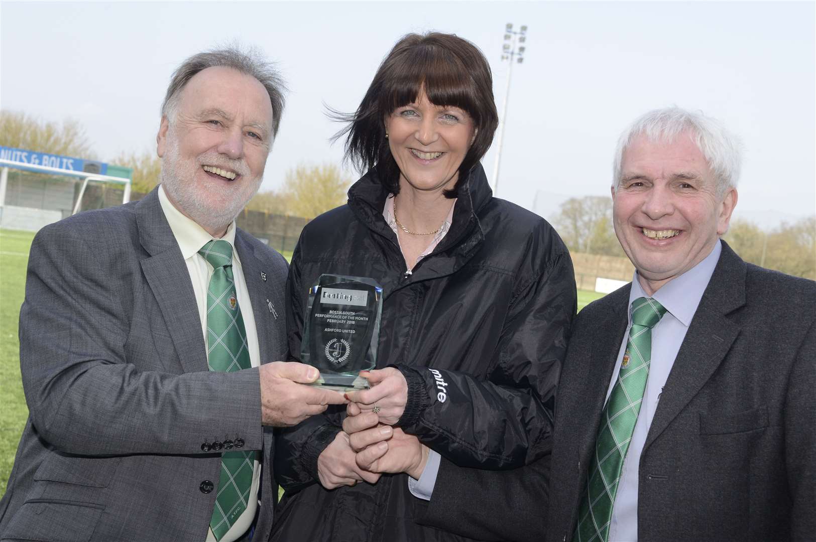 Don Crosbie and Derek Pestridge receive a performance-of-the-month award from Kellie Discipline, secretary of the-then-Bostik League, in 2018. Picture: Paul Amos