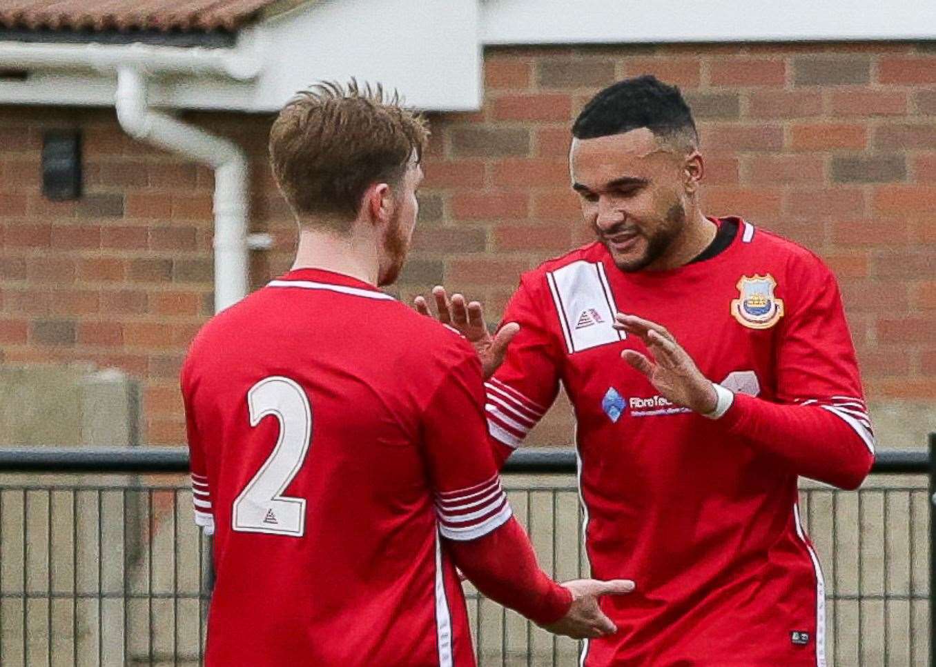 Dean Grant celebrates with team-mate Jake Mackenzie. Picture: Les Biggs