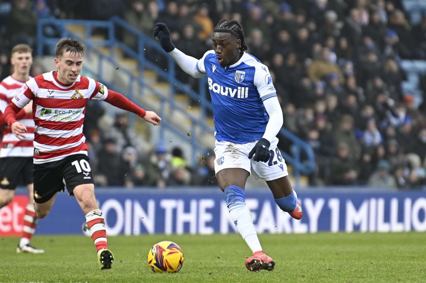 Asher Agbinone on the attack for Gillingham against Doncaster Rovers Picture: Barry Goodwin