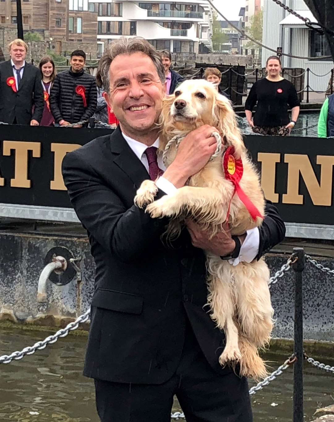 Labour’s Dan Norris celebrates with his dog Angel after being elected West of England mayor (Claire Hayhurst/PA)