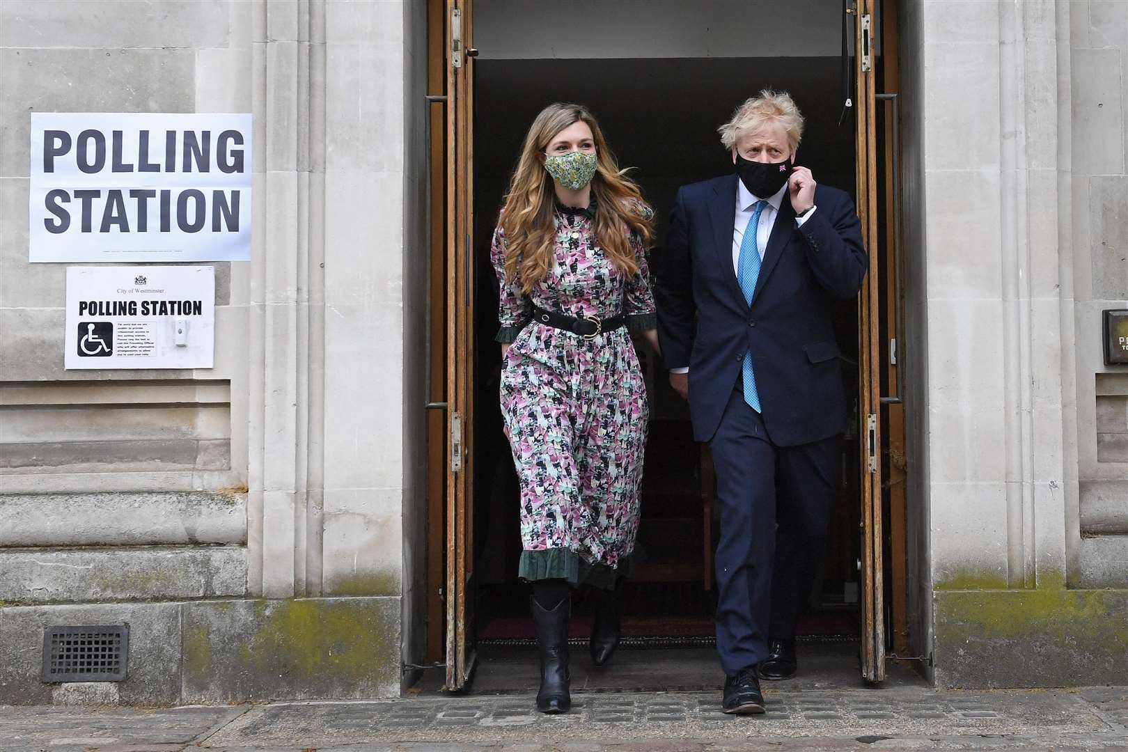 Prime Minister Boris Johnson and fiancee Carrie Symonds leave Methodist Central Hall in central London (Stefan Rousseau/PA)