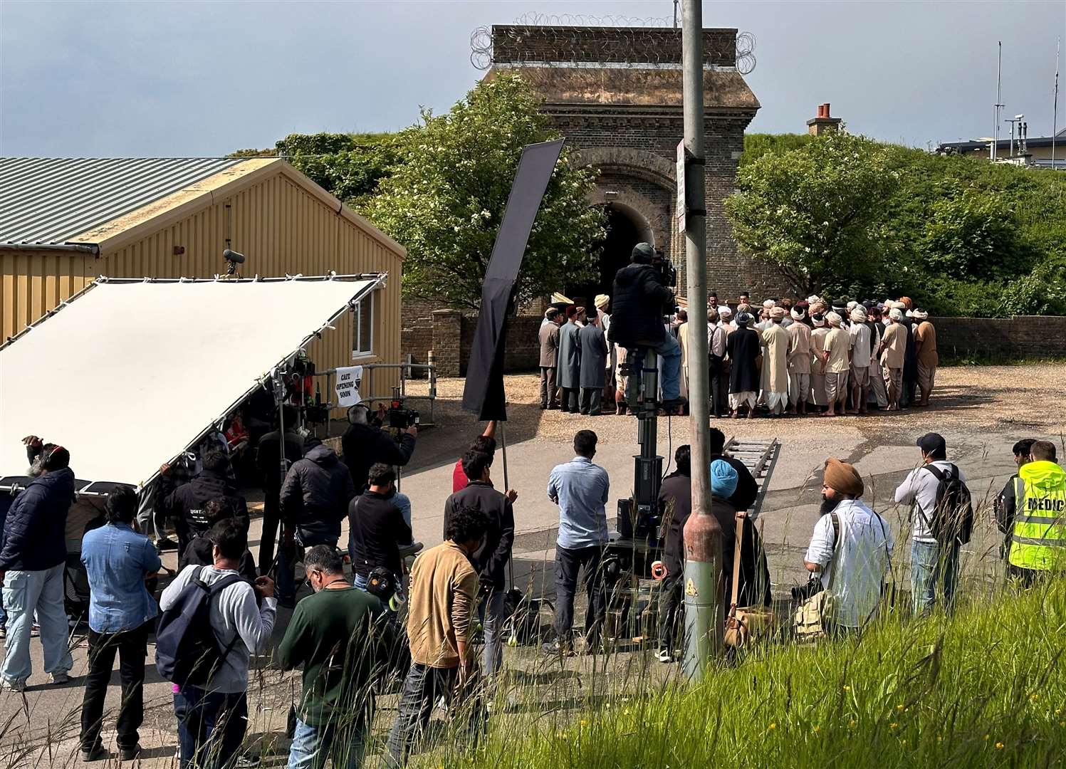 Actors, crew and extras at the main gateway of The Citadel for the filming of Gandhi