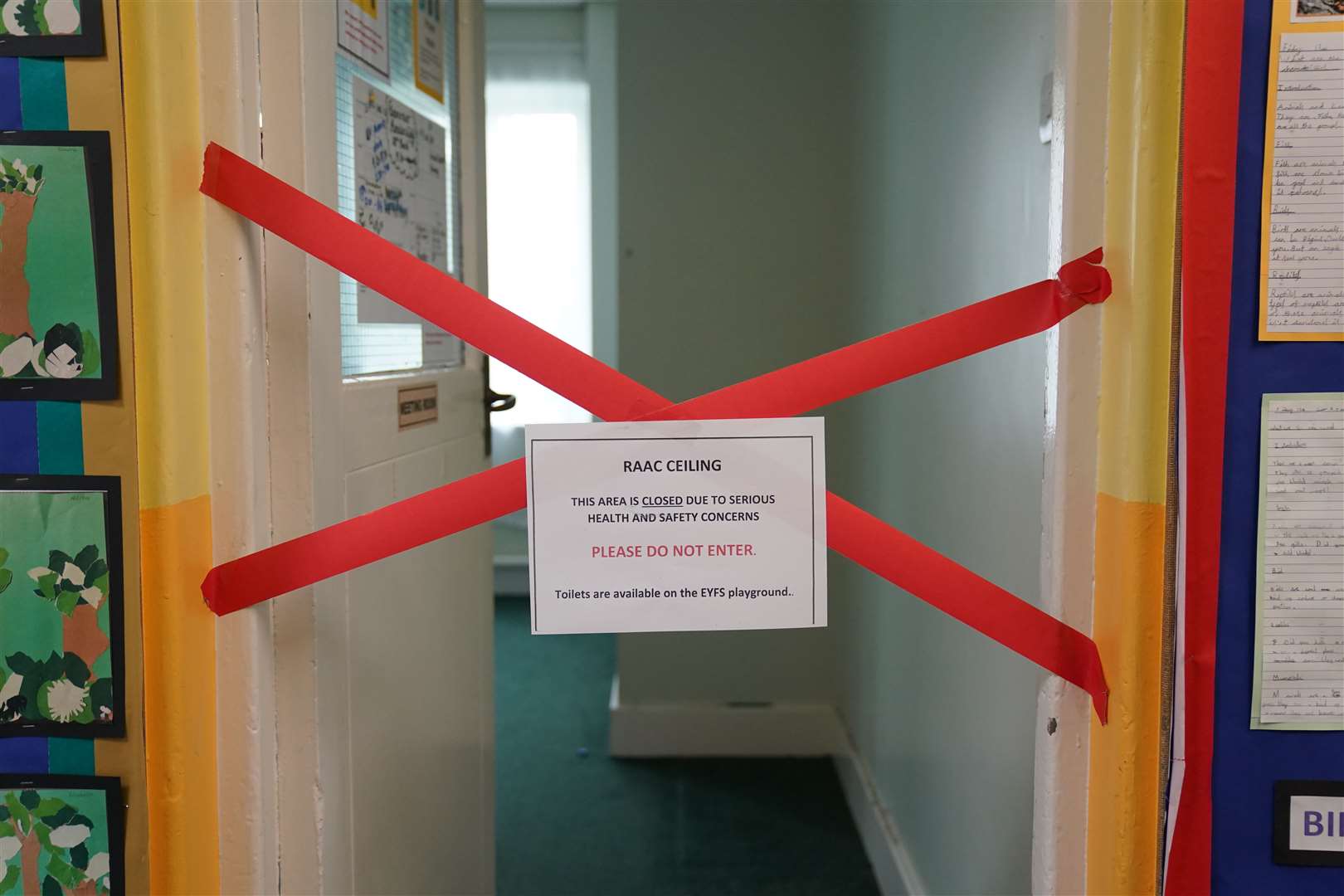 A taped off section inside a school on Friday (Jacob King/PA)