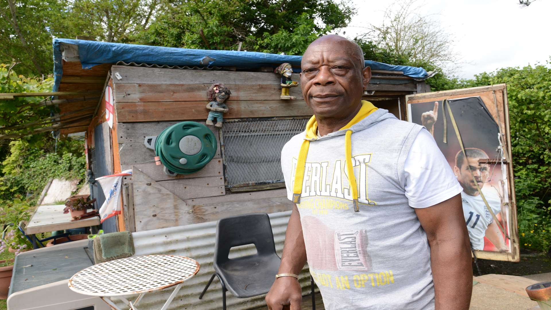 Randal Lilly next to the shed he has lived in on and off since 2013