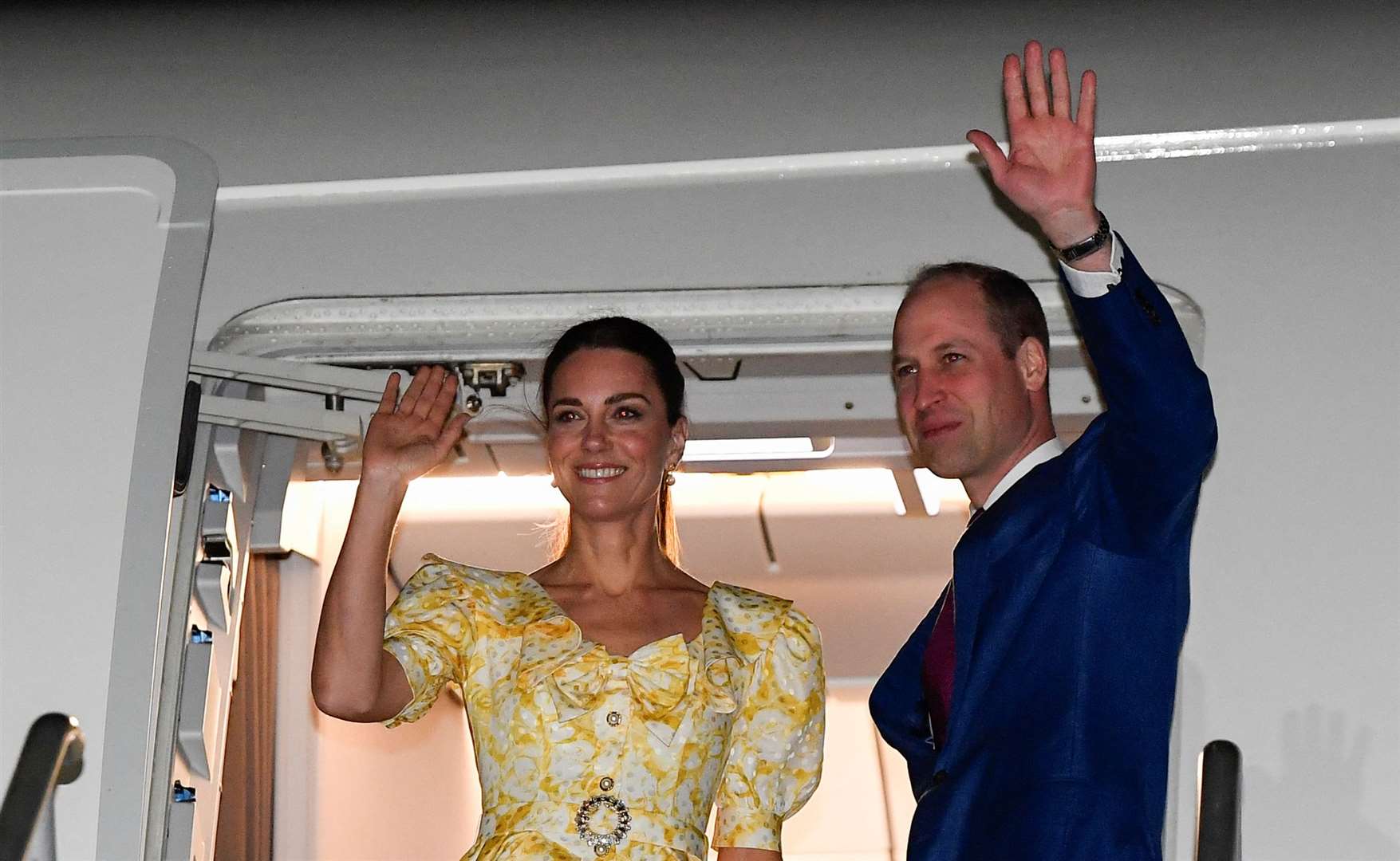 Kate and William board a plane at Lynden Pindling International Airport as they depart the Bahamas at the end of their tour of the Caribbean (Toby Melville/PA)