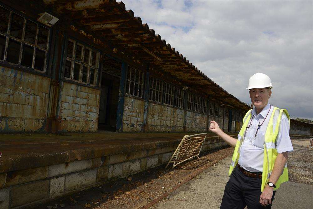 Peter Bettley pointing out one of the most damaged parts of the pier that has now undergone restoration. Pictures: Paul Amos