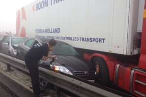 A man checks on a driver on the Sheppey Crossing. Picture: Martin Stammers