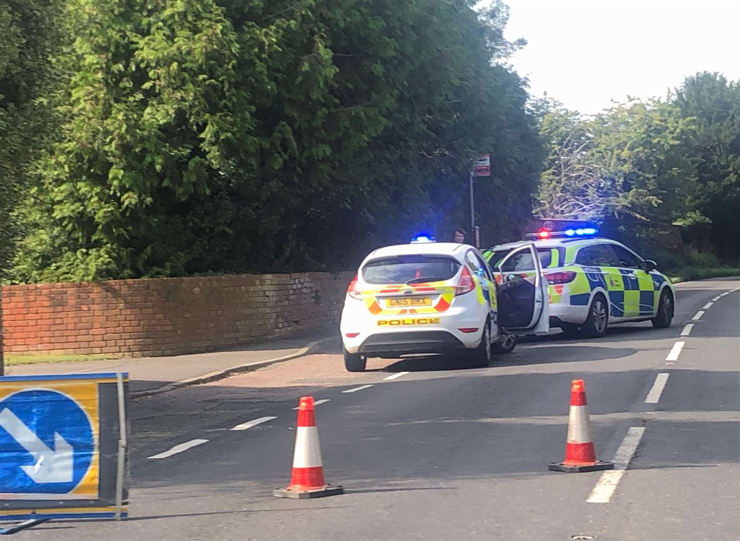 Police closed the A251 following the head-on crash