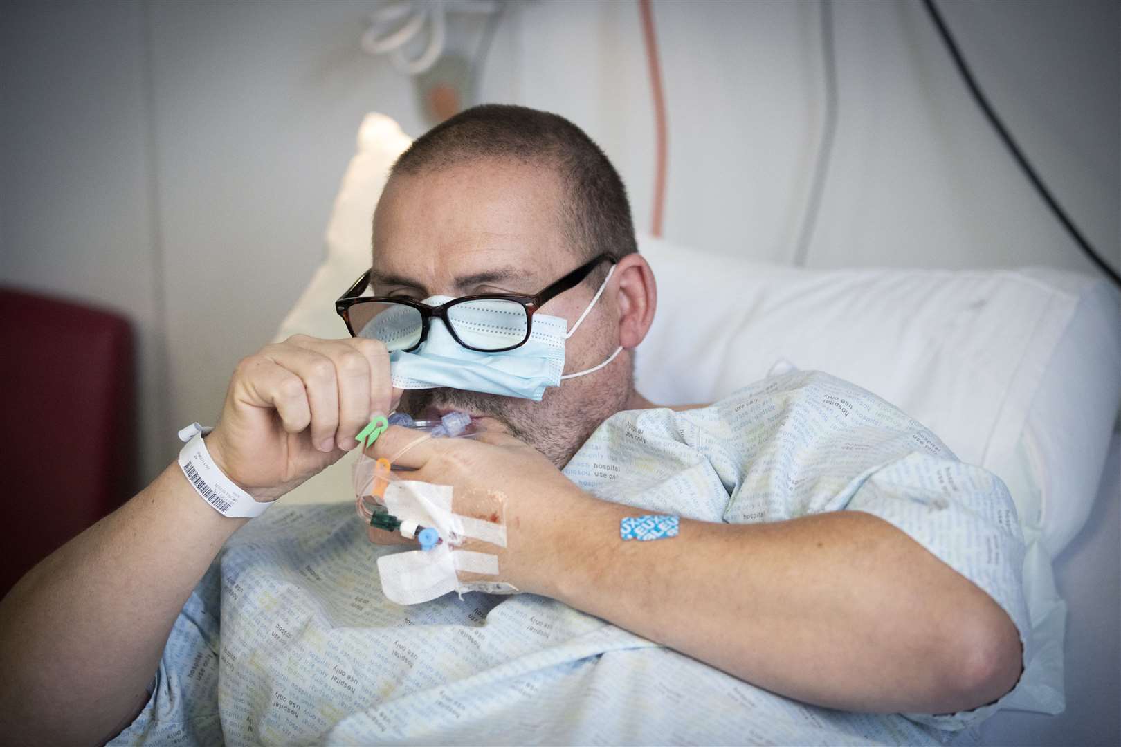 Covid patient John McAllister is being treated in the hospital’s specialist assessment and treatment area (Jane Barlow/PA)