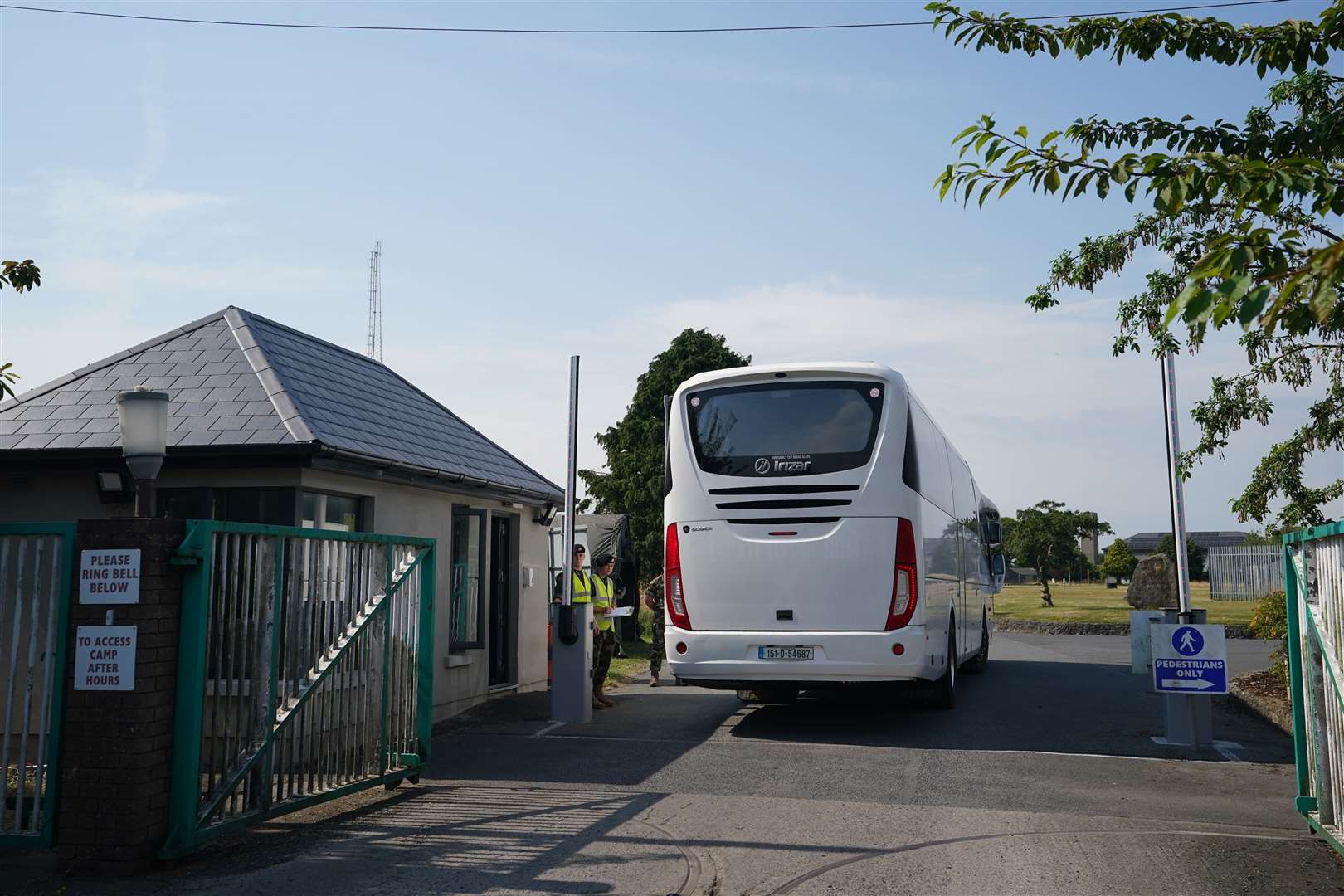 A coach of Ukrainian refugees arrives at Gormanston military camp in Co Meath (Niall Carson/PA)