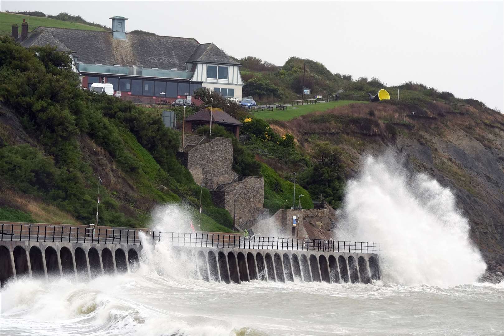 Waves crash over the promenade in Folkestone, Kent (Gareth Fuller/PA)