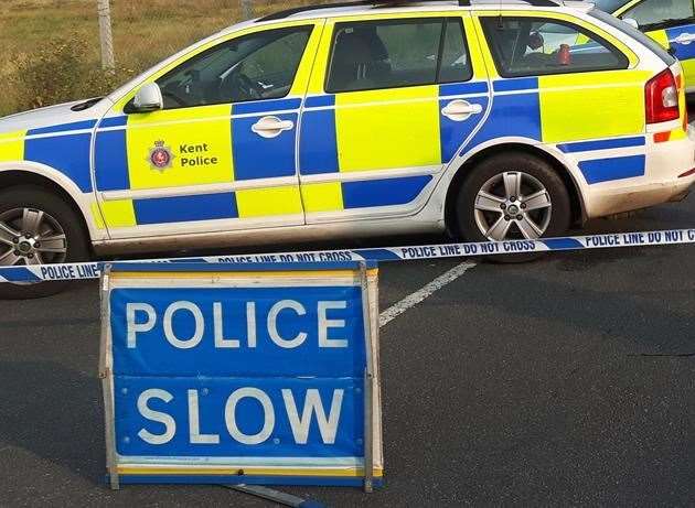 Kent police car and slow sign. Stock photo (9529985)