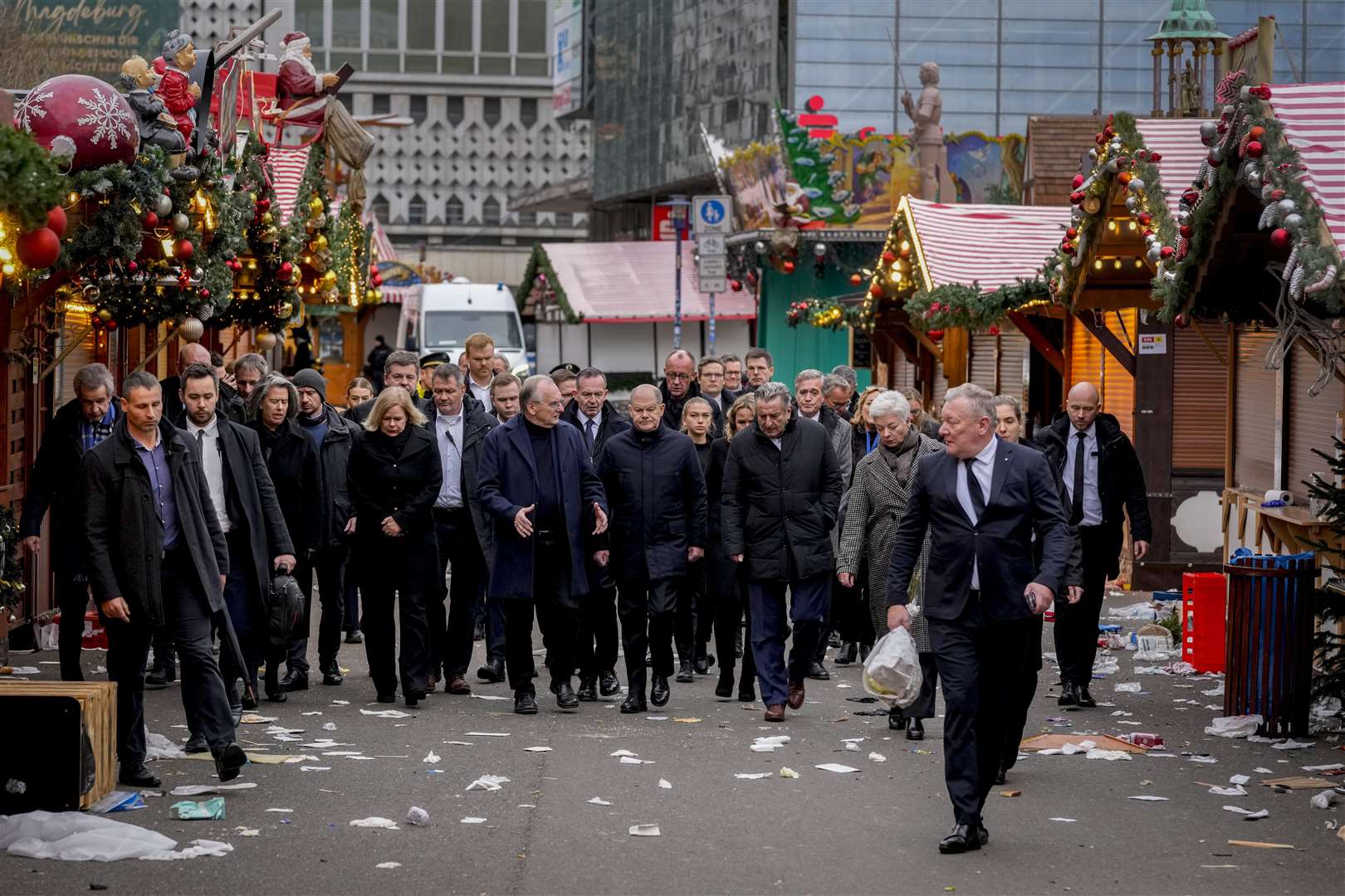 German Chancellor Olaf Scholz, centre, visited the scene of the tragedy in Magdeburg (AP Photo/Michael Probst)