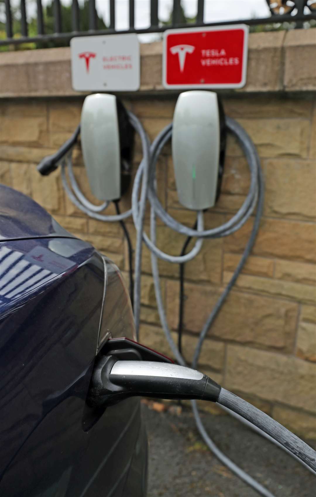 A Tesla electric car charging station in Belfast (Niall Carson/PA)