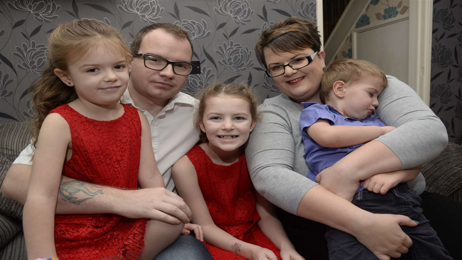 Grace Lomas, centre, with dad Graham, sister Faith, brother Arthur and mum Andrea