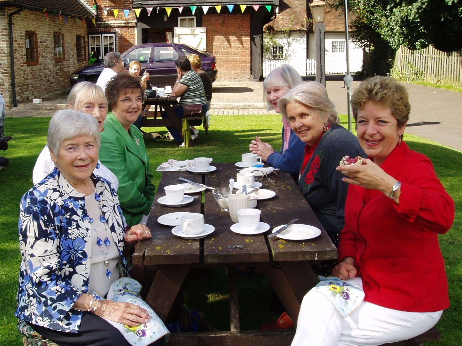 Residents and staff from Newlands Home, Westbere, enjoying cream teas at the Yew Tree. Picture: Jeannette Dawson
