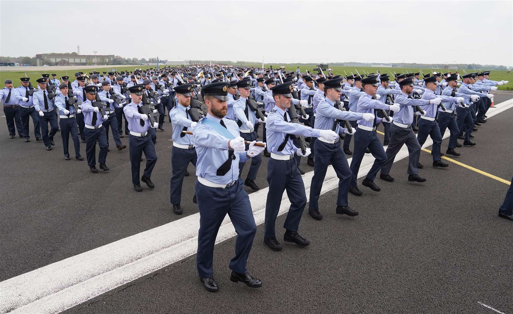 Members of the Royal Air Force march along the runway at RAF Odiham during the rehearsal (Andrew Matthews/PA)