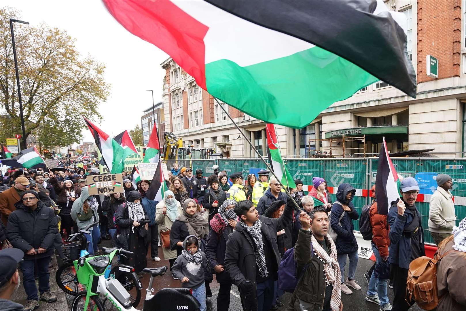 People demonstrate outside the constituency office of Labour Party leader Sir Keir Starmer, in north-west London, during a Palestine Day of Action