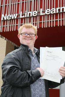 Kieran Duffy achieved nine and a half GCSE passes in what is believed to be a county record for a pupil with Down's Syndrome.