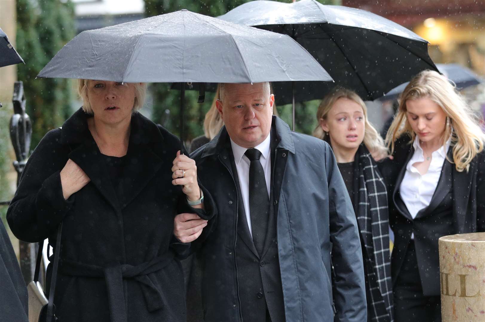 Jack Merritt’s parents, Anne and David, left, and girlfriend, Leanne O’Brien, centre (Aaron Chown/PA)