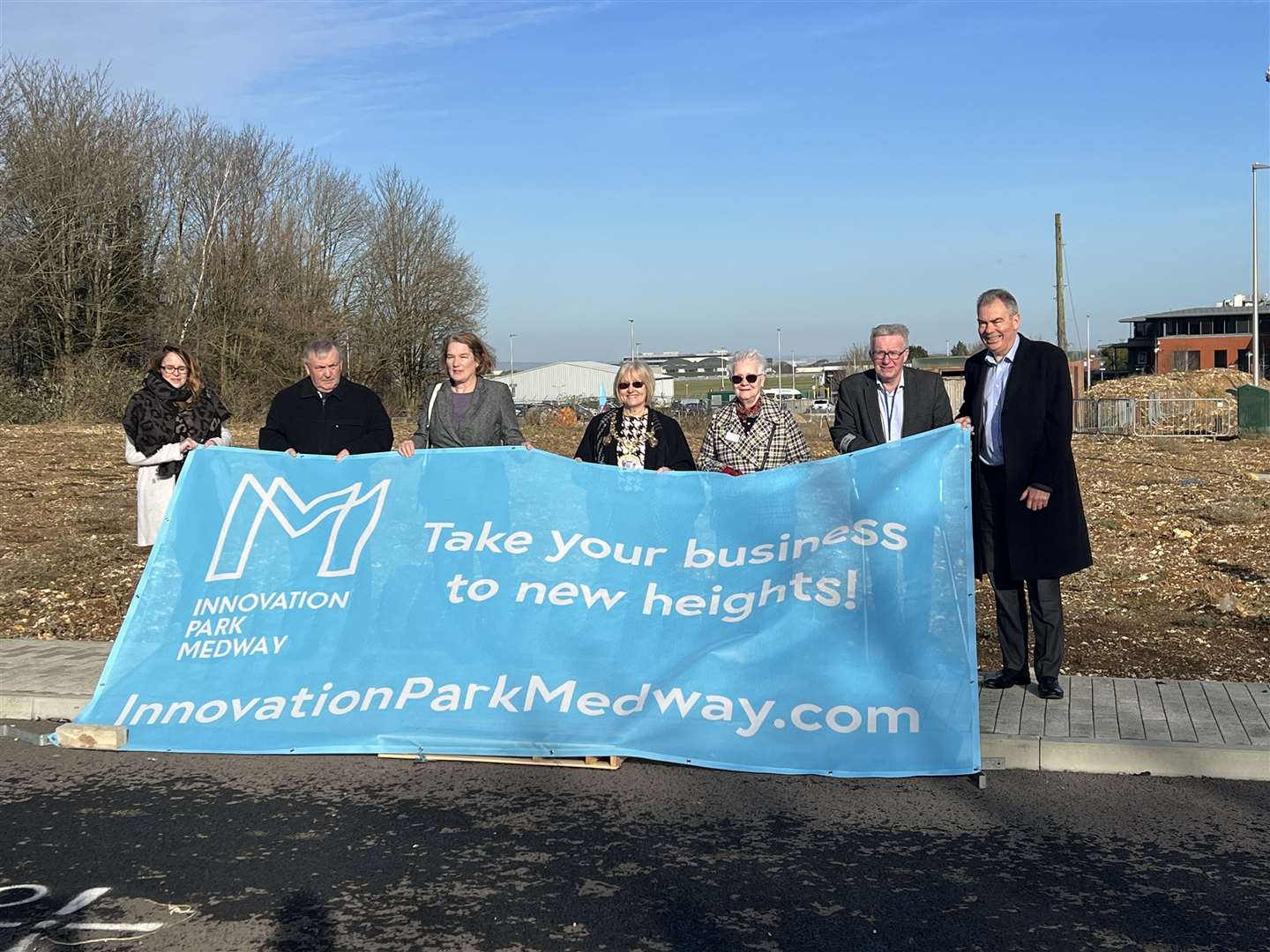 Medway councillors and officers unveiling the plots on Innovation Park Medway's southern site
