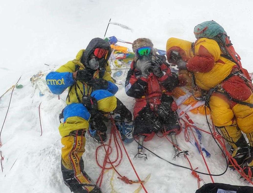 Hari Budha Magar at the summit of Mount Everest. Pics: Shanta Nepali Productions/Jeet Bahadur Tamang