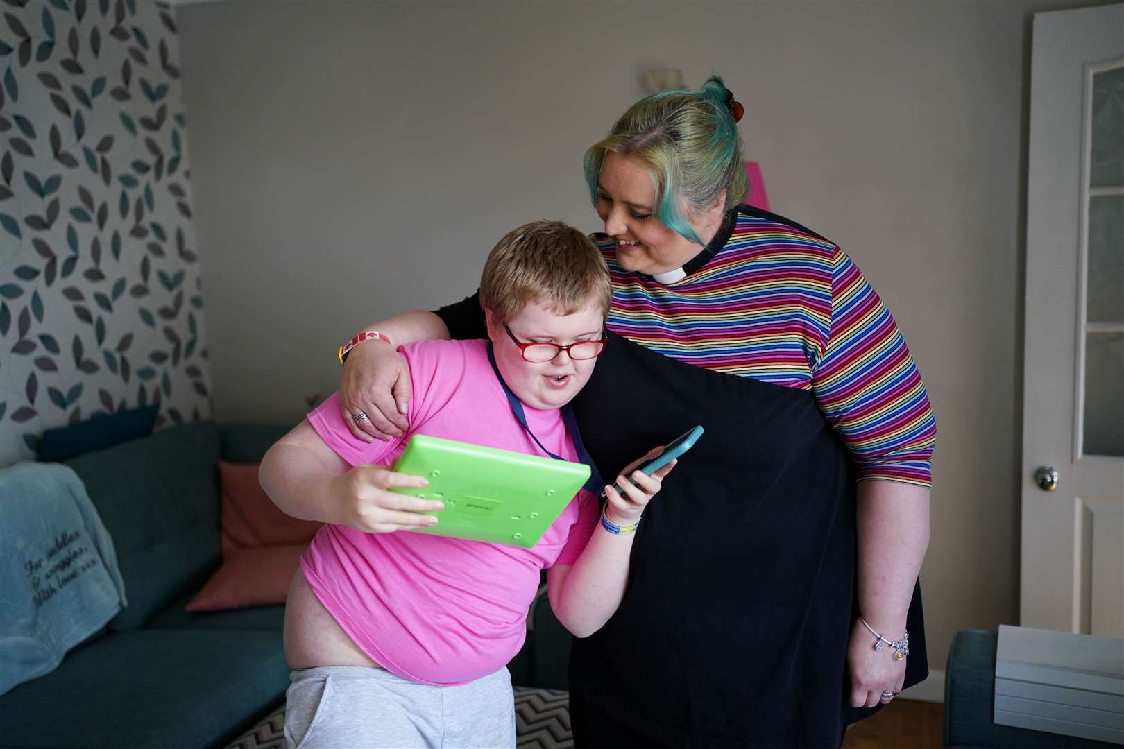 Rev Charlotte Cheshire with her son Adam (Jacob King/PA)