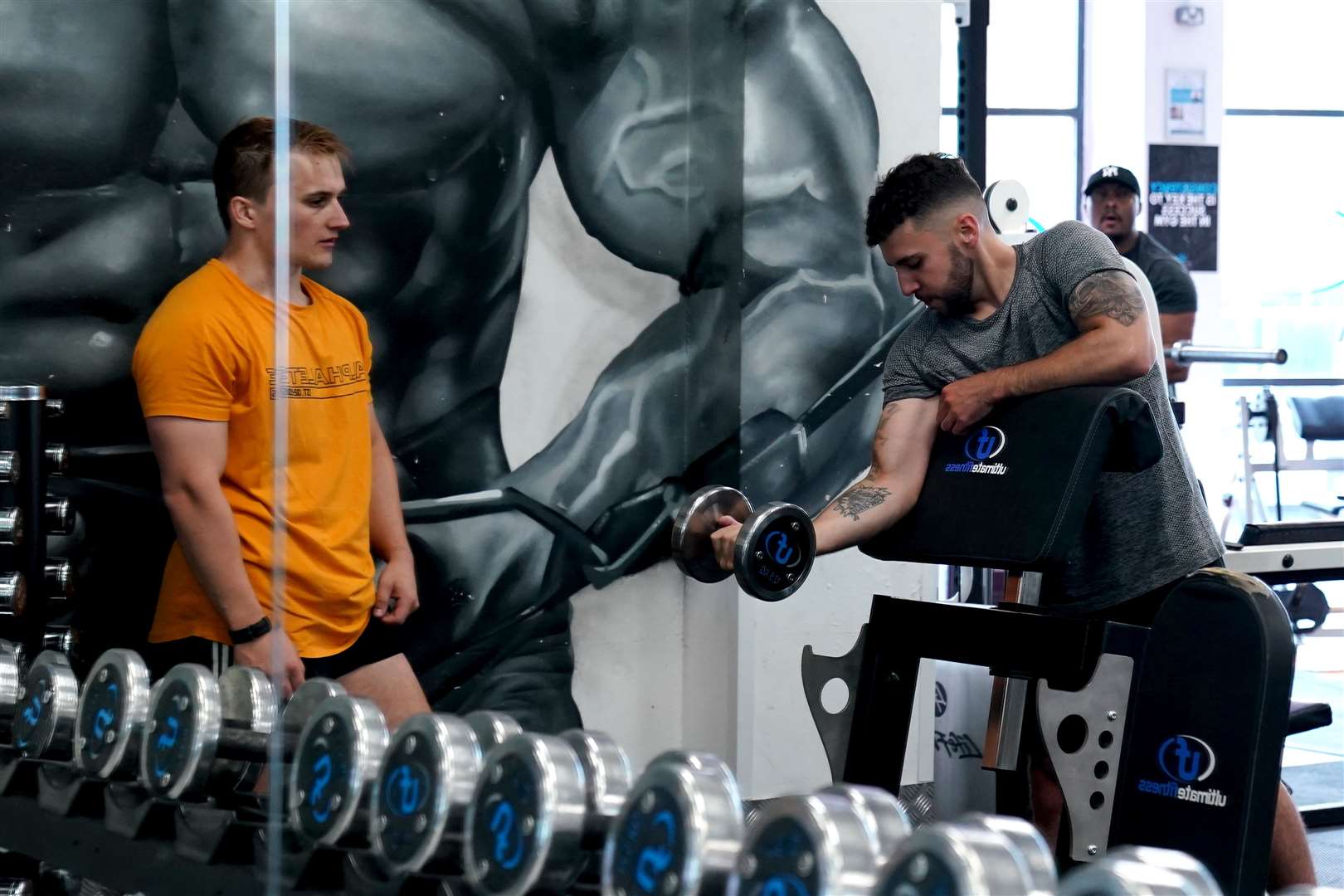 Gym members exercise at Ultimate Fitness Gym in Birmingham (Morgan Harlow/PA)