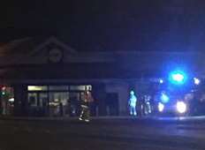 Firefighters outside Lidl's Ashford supermarket Picture: Callum Tilbee
