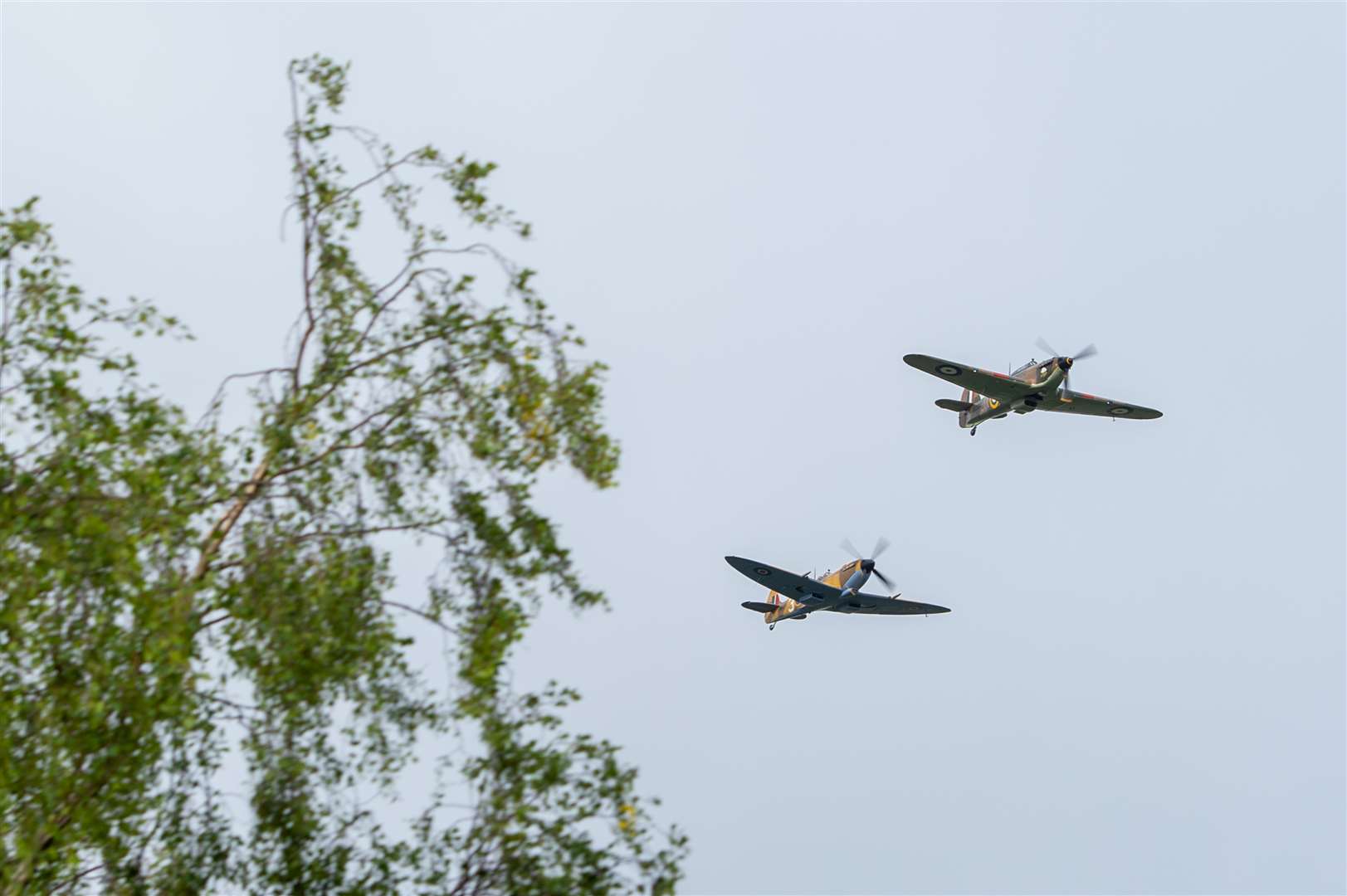 A Battle of Britain Memorial Flight flypast of a Spitfire and a Hurricane passed over Captain Tom Moore’s Bedfordshire home on Thursday (Joe Giddens/PA)