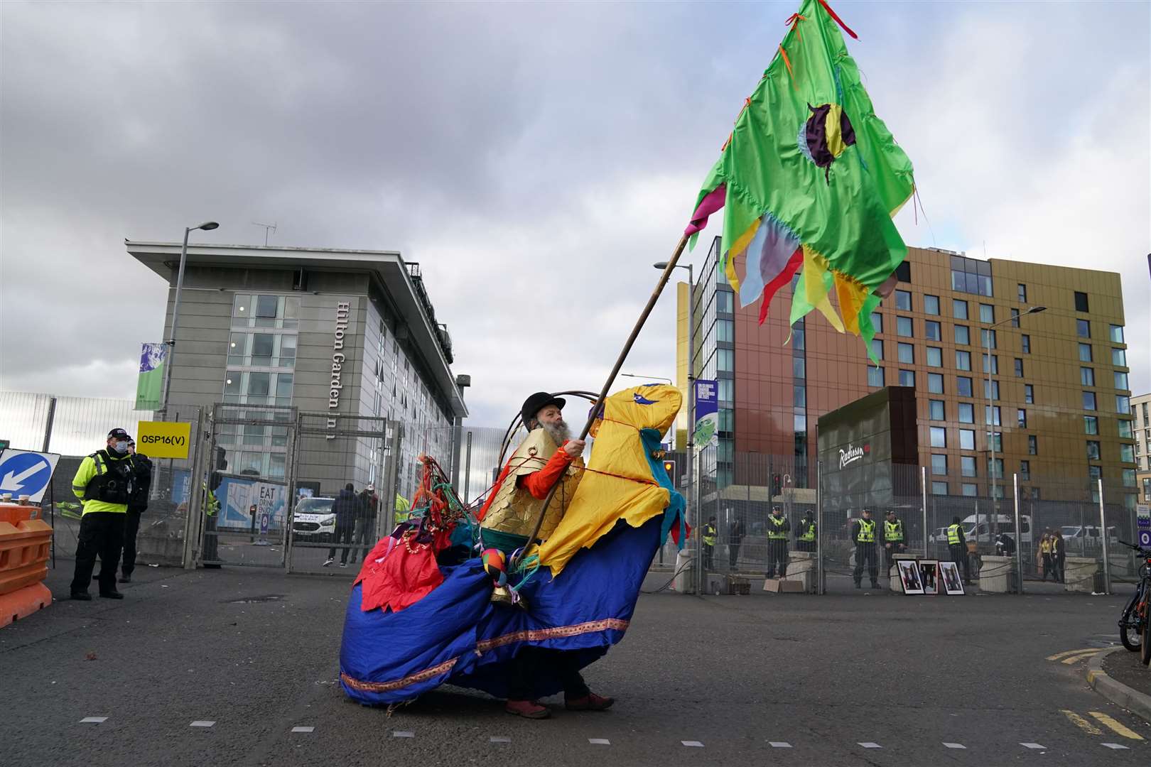 Demonstrators outside the perimeter (Andrew Milligan/PA)