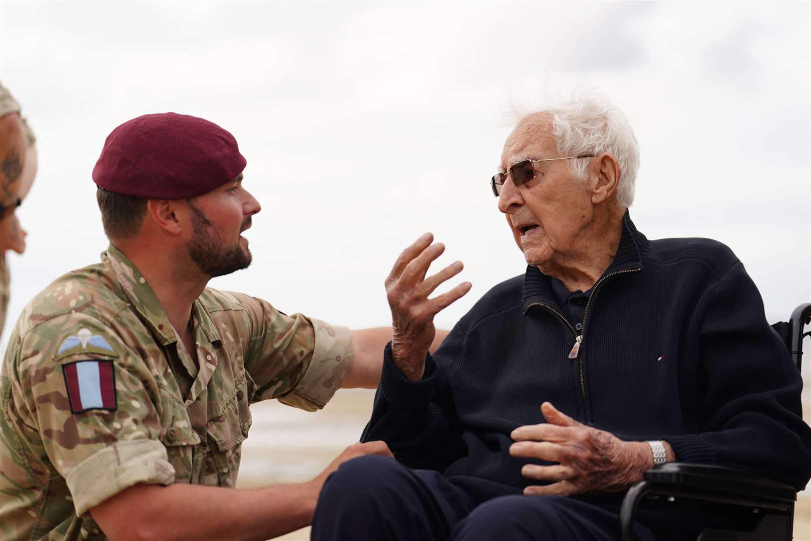 Corporal Aaron Stone and veteran John Life return to Sword Beach in Normandy (Jordan Pettitt/PA)